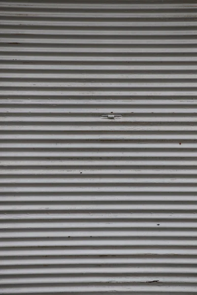 Metal store shutters