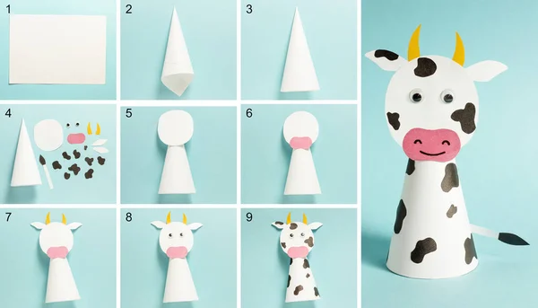 Instrucciones fotográficas paso a paso sobre cómo hacer un toro blanco con papel con sus propias manos. Símbolo del nuevo año 2021. Artesanía simple con niños —  Fotos de Stock