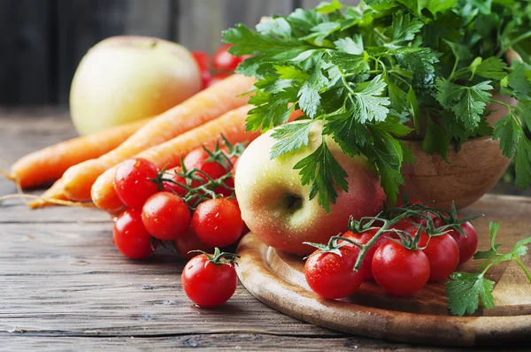 Healthy tomatoes and apple — Stock Photo, Image