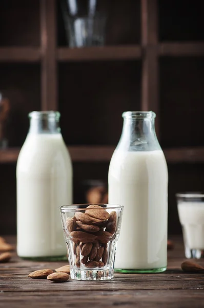 Healthy Almond milk on wooden table — Stock Photo, Image