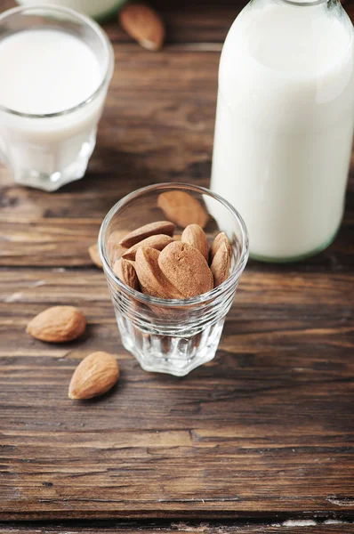 Healthy Almond milk on wooden table — Stock Photo, Image