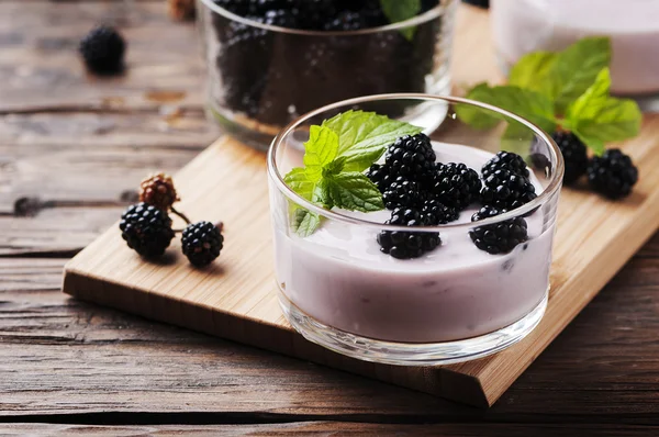 dessert with blackberries in bowls