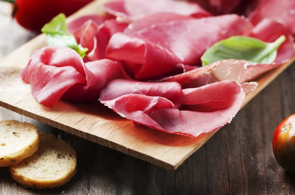 Appetizer with italian bresaola — Stock Photo, Image