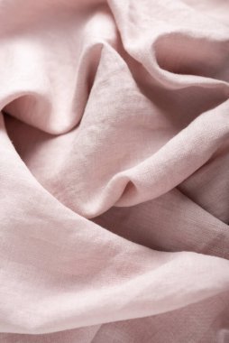 Doğal açık pembe renkte keten kumaşın arkaplan dokusu. Dikiş konsepti