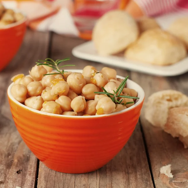 Close-up of chickpeas with rosemary — Stock Photo, Image