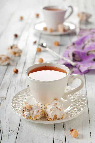 Cup of tea with nougat — Stock Photo, Image