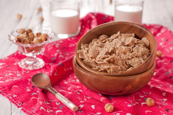 Dry muesli, nuts and milk — Stock Photo, Image