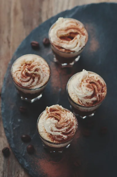 Delicious coffee with crean and cocoa — Stock Photo, Image