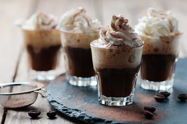 Delicious coffee with cream and cocoa — Stock Photo, Image