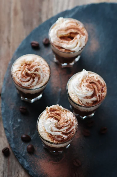 Delicious coffee with cream and cocoa — Stock Photo, Image