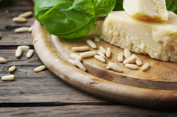 Basil, cheese and pine nuts — Stock Photo, Image
