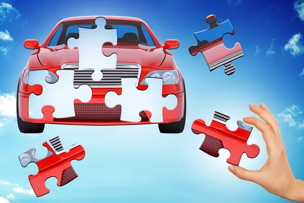 Hand making car puzzle