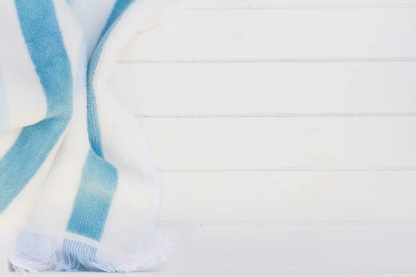 Beach towel on wood — Stock Photo, Image