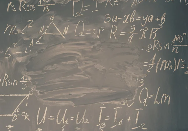 Math formulas on black board — Stock Photo, Image