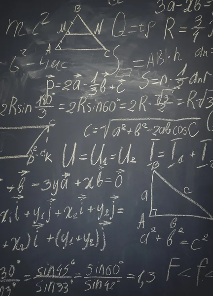 Math formulas on black board — Stock Photo, Image