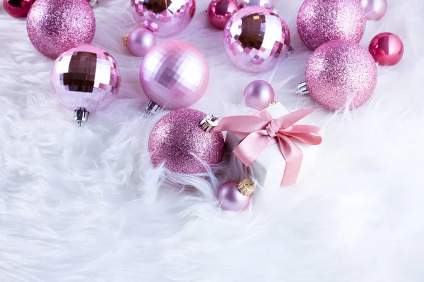 Christmas decorations on pink — Stock Photo, Image