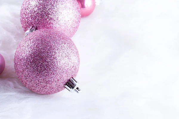 Christmas decorations on pink — Stock Photo, Image