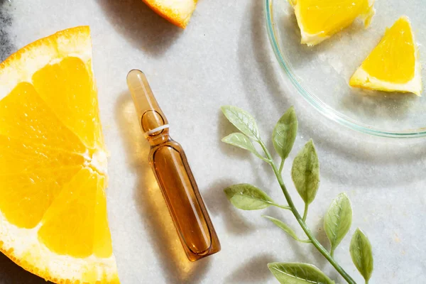 Цитрусові фрукти вітамін С сироваткова олія догляд за красою — стокове фото