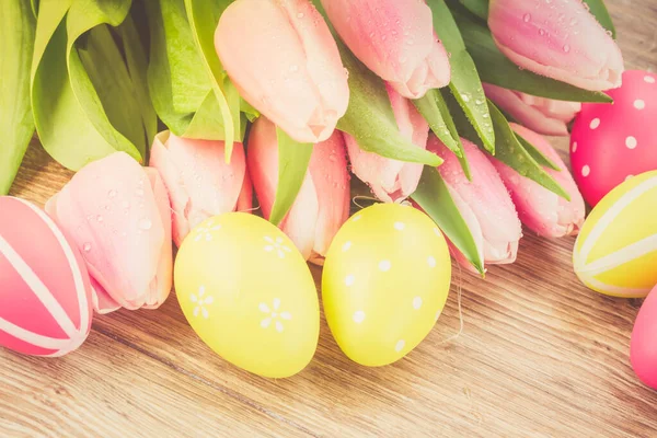 Bouquet of pink tulips with eggs — Stock Photo, Image