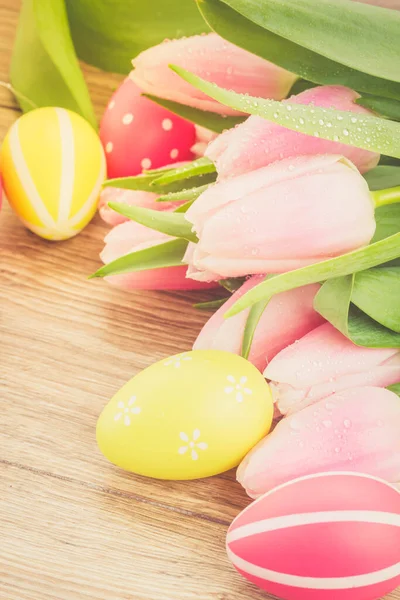 Bouquet of fresh tulips with eggs — Stock Photo, Image