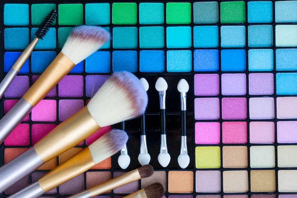 Colorful make up flat lay scene — Stock Photo, Image