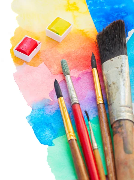 Brushes and watercolor paints border — Stock Photo, Image