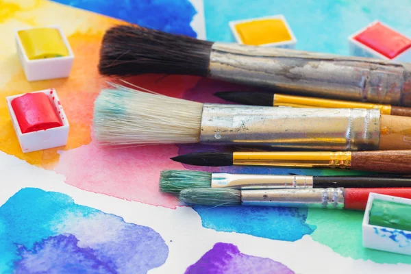 Paints and brushes — Stock Photo, Image