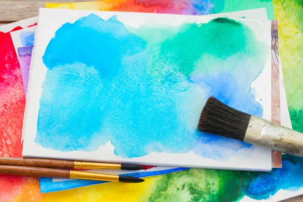 Canva with frame of paints and brushes — Stock Photo, Image