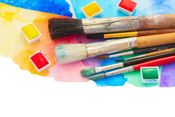 Brushes and watercolor paints border — Stock Photo, Image