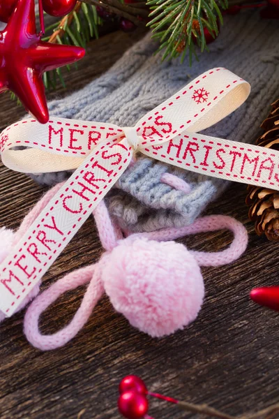 Merry christmas bow with  wool socks Stock Picture