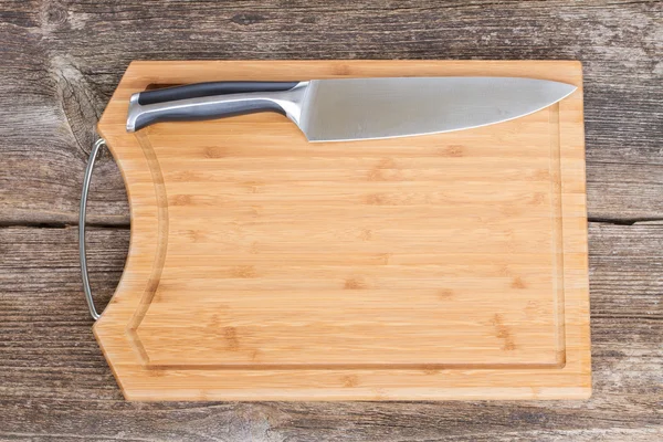 Cutting board and  knife — Stock Photo, Image