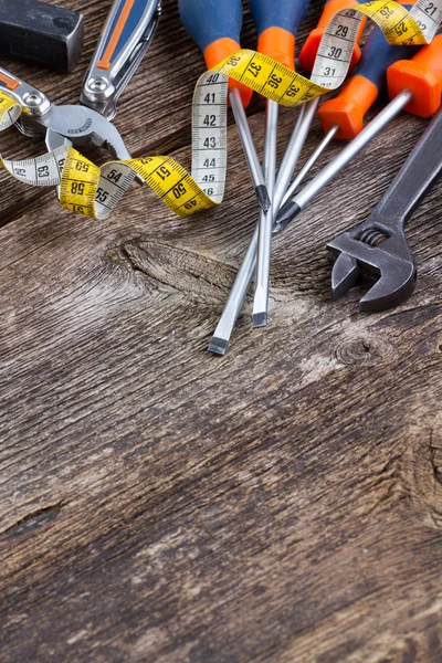 Hulpprogramma's kit frame op houten planken — Stockfoto