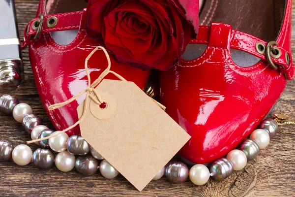 Red shoes with rose flower Stock Image