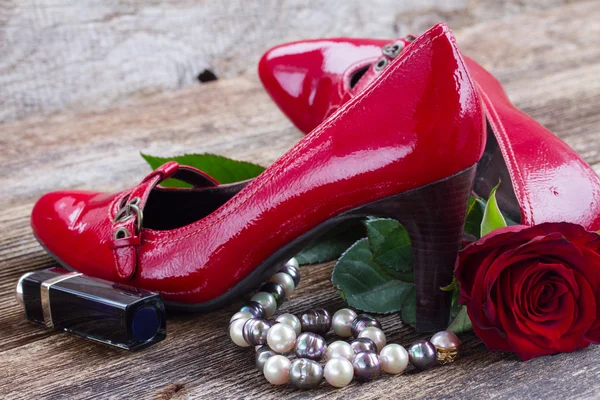 Red shoes with rose flower Stock Image