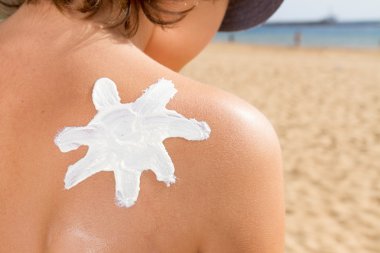 sun lotion on shoulder clipart