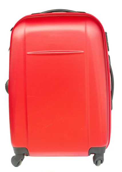 Красный чемодан в синей шляпе — стоковое фото