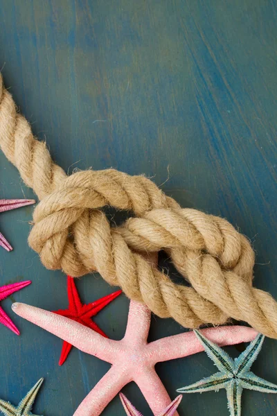 Marine rope with starfish — Stock Photo, Image