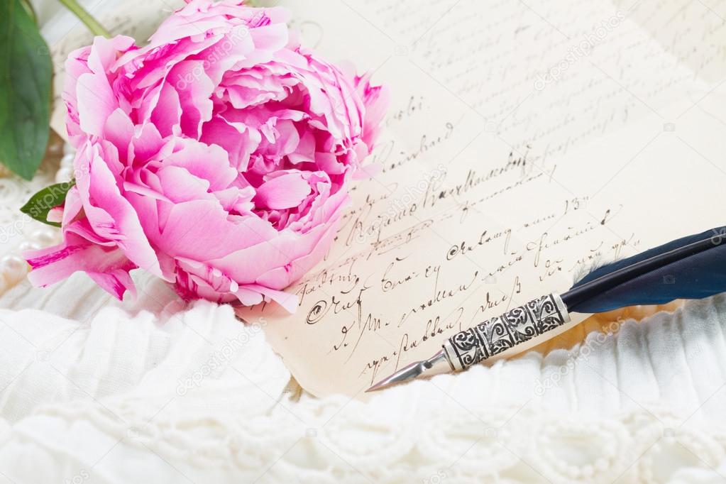 quill pen and antique letters