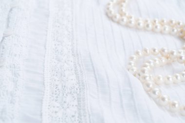 Pearl jewellery styled stock scene, for wedding invitation, product showcase or styled presentation with copy space on greeting card, top view