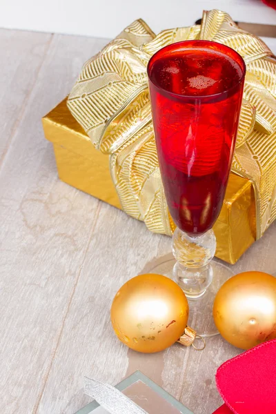 Christmas champagne in red glasses — Stock Photo, Image