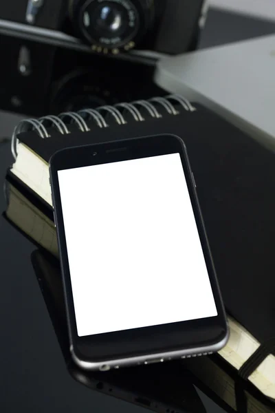 Office table with laptop, phone and supplies — Stock Photo, Image