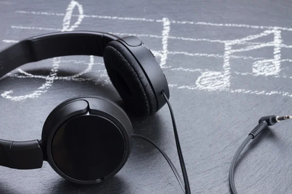 Music notes with  headphones — Stock Photo, Image