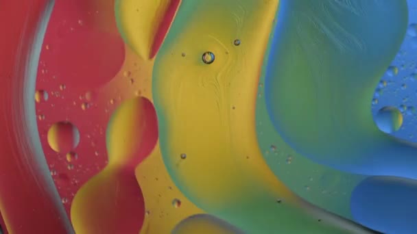 Abstracte Beweging Van Emulsie Een Gekleurde Regenboog Achtergrond — Stockvideo