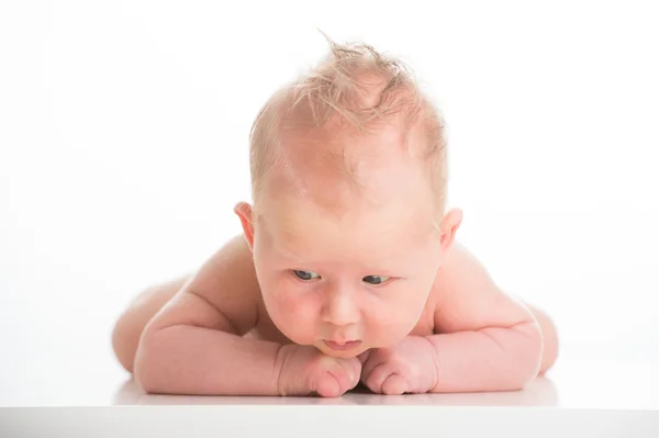 Little baby boy is trying to get up — Stock Photo, Image
