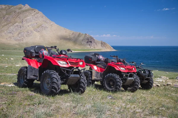 ATV on the background of the shore — стоковое фото