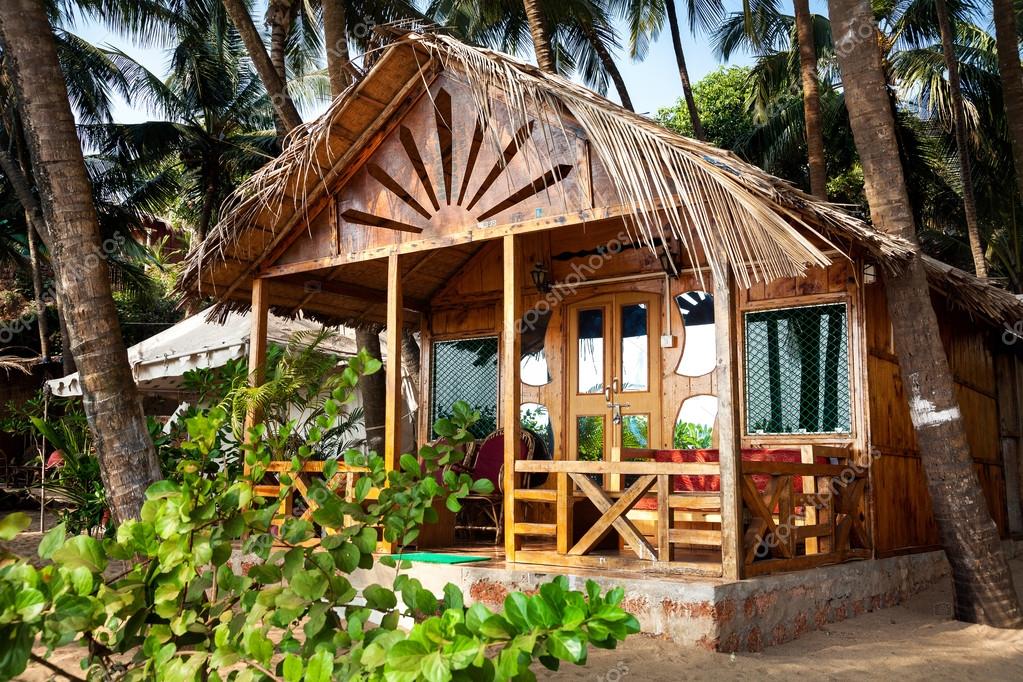 Tropical resort with palm trees — Stock Photo © byheaven 105571876