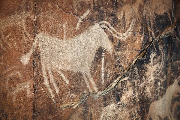 Petroglyph with animals on the rock — Stock Photo, Image