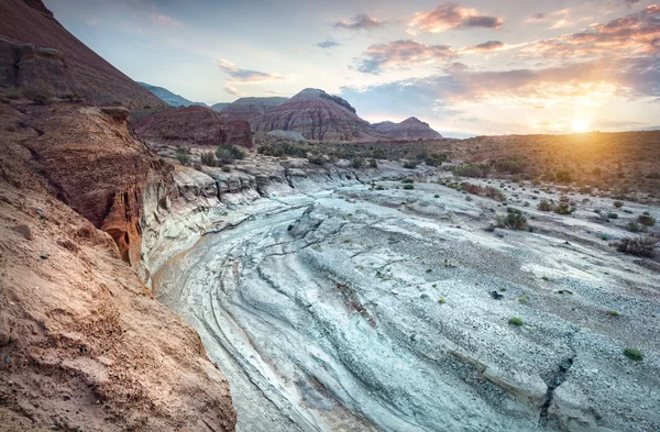 Sunrise in the desert with canyon — Stock Photo, Image