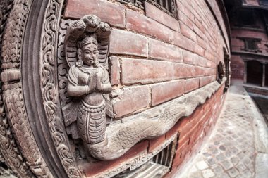 Wooden carvings in Nepal  clipart