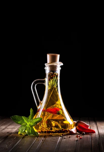 Homemade oil with herbs — Stock Photo, Image